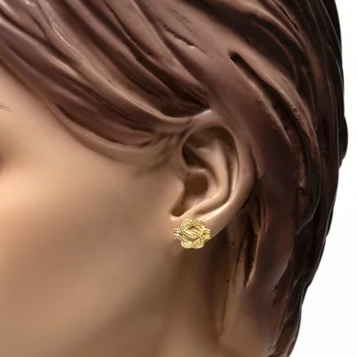 Mattenklopper oorbellen goud | Mattenklopper oorbellen zilver | Mattenklopper oorbellen betekenis