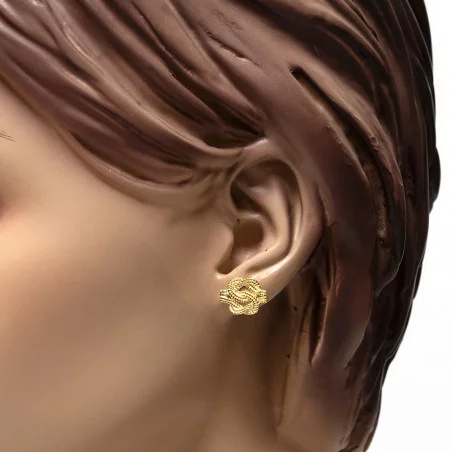 Mattenklopper oorbellen goud | Mattenklopper oorbellen zilver | Mattenklopper oorbellen betekenis