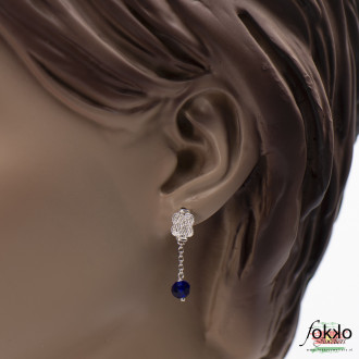 Mattenklopper oorbellen | Surinaamse mattenklopper oorbellen blauwe kraal 2